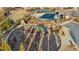 Aerial shot showcasing the community playground with swings, slides, and nearby fireplace at 7630 Rambling Vale, Cumming, GA 30028
