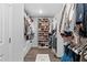 Large closet featuring custom shelving and a rod system providing ample storage at 7630 Rambling Vale, Cumming, GA 30028