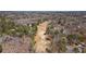 Expansive aerial view of golf course surrounded by trees at 935 Tiber Cir, Alpharetta, GA 30022