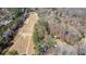 Attractive aerial view showcases the house near a golf course at 935 Tiber Cir, Alpharetta, GA 30022