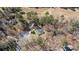 Beautiful aerial view of the house surrounded by trees at 935 Tiber Cir, Alpharetta, GA 30022