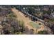 Scenic aerial view of golf course near residential area at 935 Tiber Cir, Alpharetta, GA 30022
