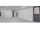 Spacious finished basement with recessed lighting and easy access to basement kitchen at 935 Tiber Cir, Alpharetta, GA 30022