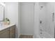 Bathroom features updated vanity with modern fixtures and shower and tub combo at 935 Tiber Cir, Alpharetta, GA 30022