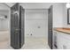 Convenient laundry room located off the bathroom features a washer and dryer hookup at 935 Tiber Cir, Alpharetta, GA 30022