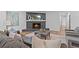 Comfortable living room featuring a fireplace, plush seating, and stylish decor at 935 Tiber Cir, Alpharetta, GA 30022