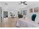 Bright living room with fireplace, hardwood floors, and modern furniture at 935 Tiber Cir, Alpharetta, GA 30022