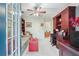 Spacious living area featuring a bright red coffee table, desk, and cozy seating at 1507 Country Park Se Dr, Smyrna, GA 30080