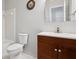 Cozy bathroom featuring a single sink vanity, toilet, and tiled shower at 4010 Arborwood Ln, Tucker, GA 30084