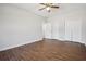 Bedroom with hardwood floors and double door closets at 4010 Arborwood Ln, Tucker, GA 30084