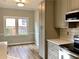 Eat-in kitchen area with breakfast nook, light cabinets, and lots of natural light at 4010 Arborwood Ln, Tucker, GA 30084