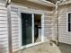 View of the patio through sliding glass doors at 4010 Arborwood Ln, Tucker, GA 30084