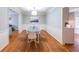 Dining room with hardwood floors, a modern light fixture, and wainscoting at 50 Sycamore Sta, Decatur, GA 30030