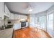 Bright kitchen features white cabinets, stainless steel appliances, and a breakfast nook at 50 Sycamore Sta, Decatur, GA 30030