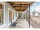 Charming covered patio with seating, creating a cozy outdoor space for relaxation and entertainment at 50 Sycamore Sta, Decatur, GA 30030