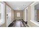 Inviting entryway with wood-look floors, fresh paint, and white trim, perfect for a warm welcome at 5125 West St, Forest Park, GA 30297