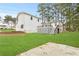 Spacious backyard with deck and two-story house at 712 Berts Nw Cir, Lilburn, GA 30047