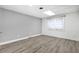 Finished basement space with new flooring and a large window at 712 Berts Nw Cir, Lilburn, GA 30047