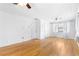 Well-lit bedroom with hardwood floors and a window providing natural light at 712 Berts Nw Cir, Lilburn, GA 30047