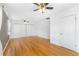 Bright bedroom with hardwood floors, large closets, and ample natural light at 712 Berts Nw Cir, Lilburn, GA 30047