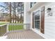 Charming exterior detail with a view of the house number and yard at 712 Berts Nw Cir, Lilburn, GA 30047