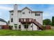 Expansive backyard features a deck, stairs, and ample space for outdoor activities at 980 Charter Club Dr, Lawrenceville, GA 30043