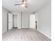 Bedroom with carpeting features a ceiling fan, closet and doorway at 980 Charter Club Dr, Lawrenceville, GA 30043