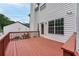 Inviting wood deck offers a perfect spot for outdoor relaxation and entertaining at 980 Charter Club Dr, Lawrenceville, GA 30043