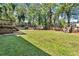 Spacious backyard featuring a deck, playground, and grassy area for Gathering fun at 1464 Sagamore Ne Dr, Atlanta, GA 30345