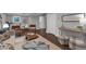 Open basement layout with a dining table, comfortable seating, and modern decor at 1464 Sagamore Ne Dr, Atlanta, GA 30345