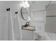 Charming bathroom with granite countertops, stylish fixtures, and tiled shower at 1464 Sagamore Ne Dr, Atlanta, GA 30345