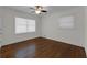 Bright bedroom features hardwood floors and large windows for natural light at 1464 Sagamore Ne Dr, Atlanta, GA 30345
