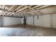 Unfinished basement with exposed ceiling and concrete flooring, ready for customization at 4585 Yates Rd, Atlanta, GA 30337