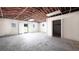 Spacious unfinished basement featuring white block walls and concrete flooring at 4585 Yates Rd, Atlanta, GA 30337