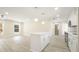 Bright and open kitchen space features a center island, and modern appliances at 4585 Yates Rd, Atlanta, GA 30337