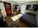 Bedroom featuring wood floors, natural light, closet and pirate decor at 4835 John Burruss Rd, Cumming, GA 30040