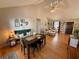 Bright living room and dining area featuring hardwood floors and plenty of natural light at 4835 John Burruss Rd, Cumming, GA 30040