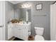 Bathroom features a white vanity, toilet and shower/bath at 1850 Cotillion Dr # 4419, Atlanta, GA 30338