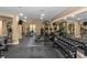 Community gym with stationary bikes, weight machines, free weights, and mirrored walls at 1850 Cotillion Dr # 4419, Atlanta, GA 30338