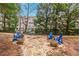 Outdoor seating area with patio, chairs and landscaping at 1850 Cotillion Dr # 4419, Atlanta, GA 30338