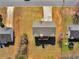 Aerial view of the home showing the backyard, neighboring properties, and roof detail at 195 Brighton Dr, Covington, GA 30016