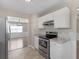 View of kitchen featuring stainless steel appliances and granite countertops at 195 Brighton Dr, Covington, GA 30016