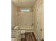 Bathroom featuring a single vanity, toilet and tub with shower at 2015 Aldbury Ln, Woodstock, GA 30189