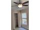 Bedroom featuring neutral walls, carpet, closet and a window letting in natural light at 2015 Aldbury Ln, Woodstock, GA 30189