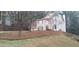 Attractive home features a well-maintained lawn and two car garage at 2015 Aldbury Ln, Woodstock, GA 30189