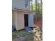 Exterior of home shows a shed with a door at 2015 Aldbury Ln, Woodstock, GA 30189