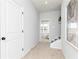 Upstairs hallway with carpet and picture, leading to other areas of the home at 337 Skylar Se Way, Atlanta, GA 30315