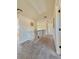 Carpeted hallway with railing and multiple doors at 150 Amelia Way, Ellenwood, GA 30294