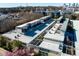 Aerial view of a modern building with rooftop terraces, showcasing a unique urban living experience at 400 Village Ne Pkwy # 114, Atlanta, GA 30306
