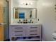 Well-lit bathroom showcasing a double vanity with a modern mirror and stylish fixtures at 400 Village Ne Pkwy # 114, Atlanta, GA 30306